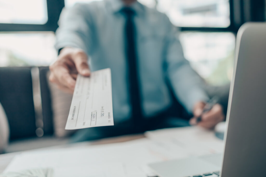 Handing over a payslip