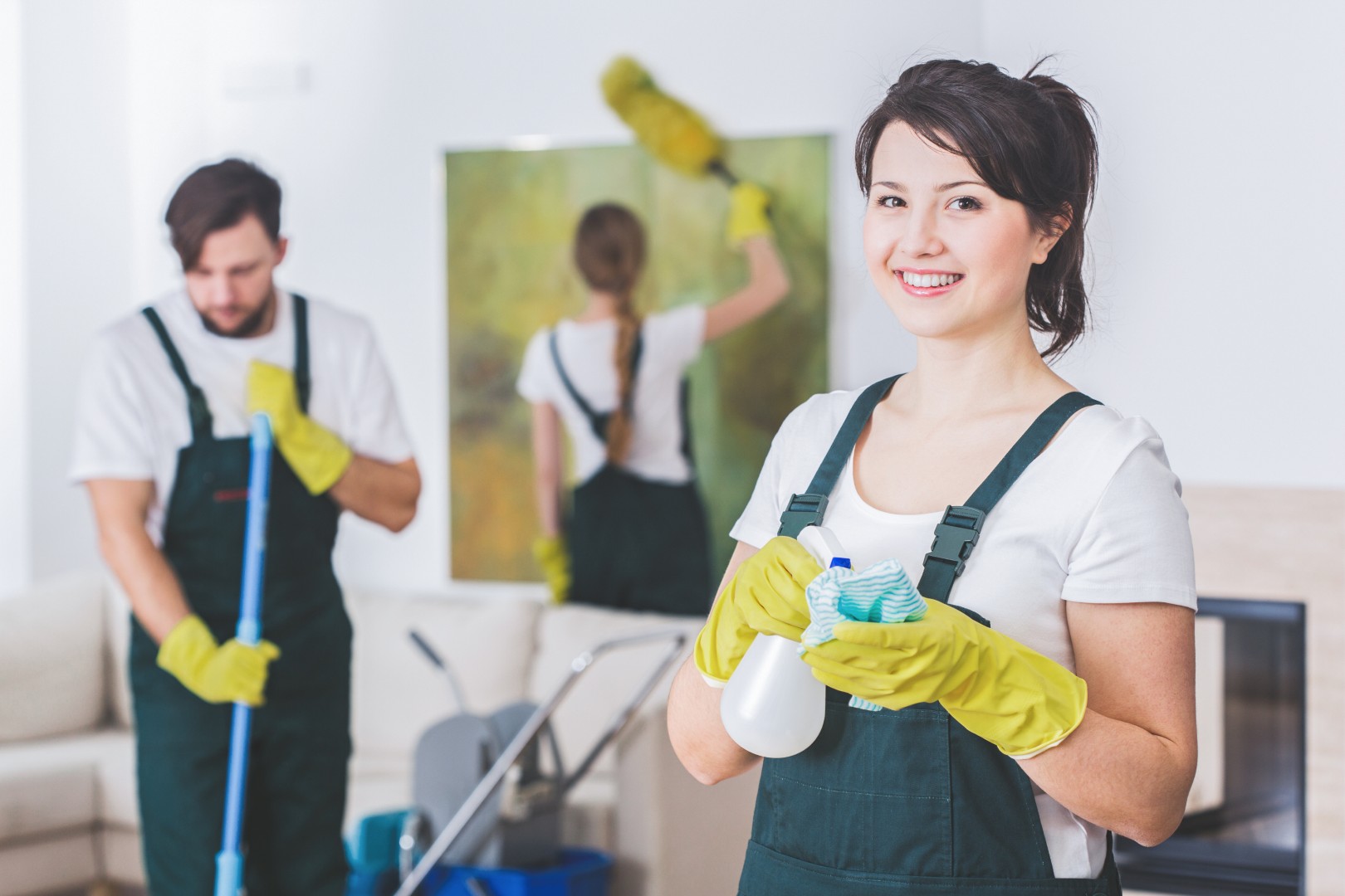 Group of young, hard-working professional cleaners
