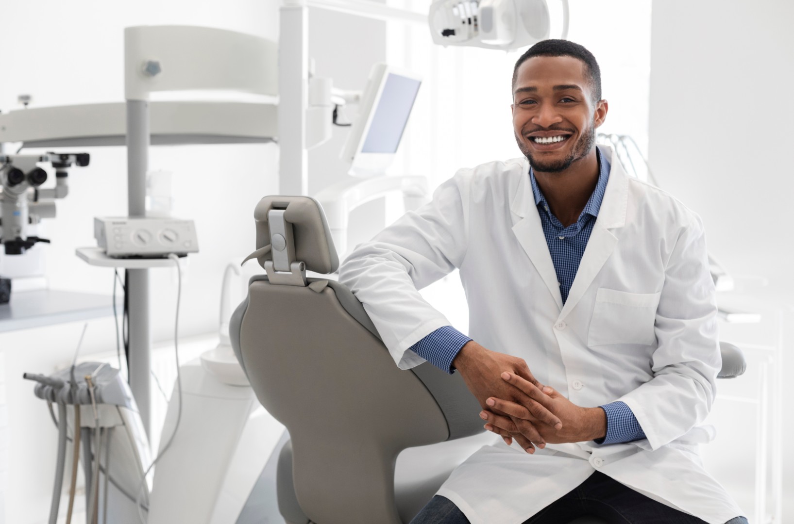 Dentist sat in dental chair